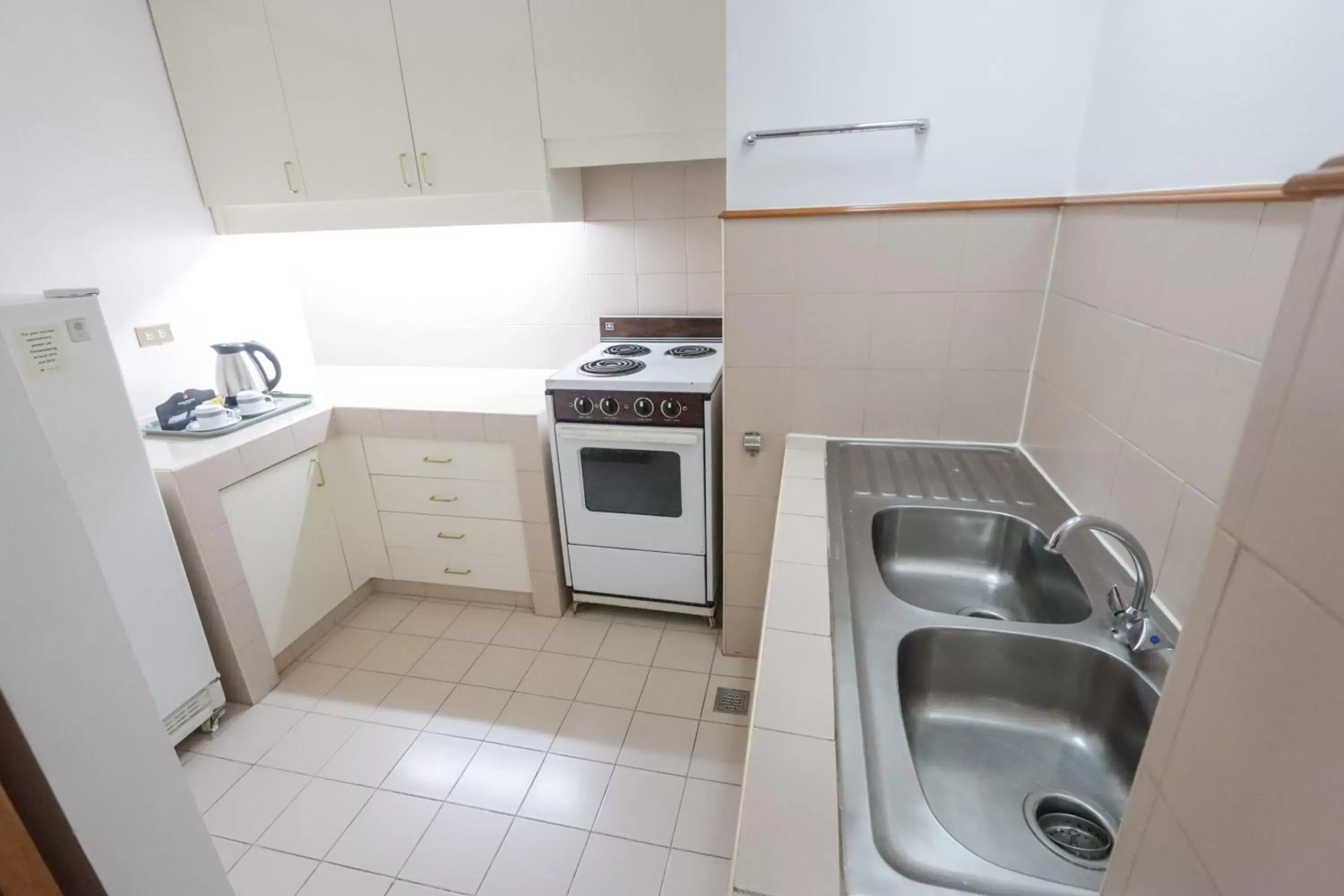 Kitchen or kitchenette in Century Park Hotel